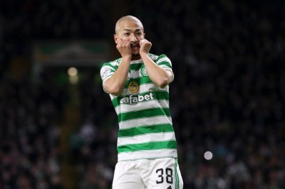 Daizen Maeda celebrates as he scores on his debut for Celtic in a 2-0 win against Hibernian